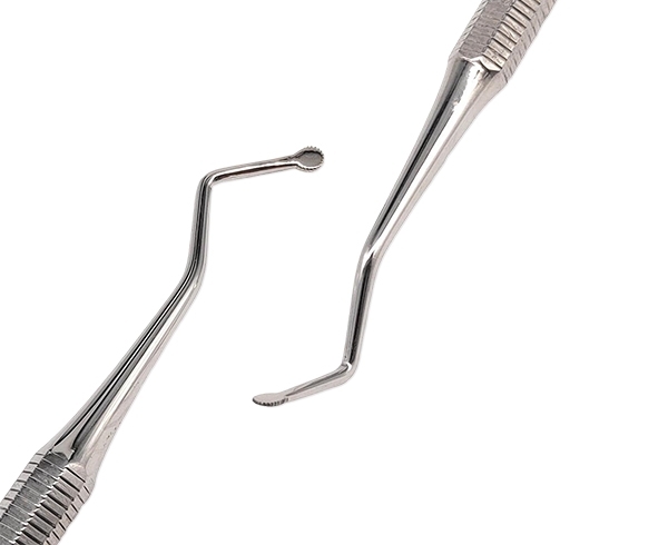 ابزار دندانپزشکی از جمله قلم نخ زیر لثه و جینجیوال کورد پکر - دندال